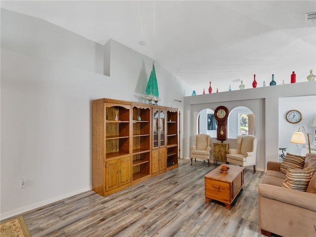 2540 12th Sq SW, Vero Beach, FL 32968 - living room with light wood-type flooring and high vaulted ceiling