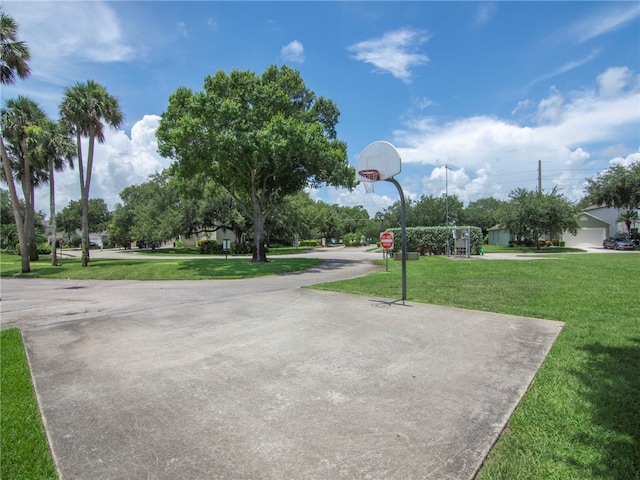 2540 12th Sq SW, Vero Beach, FL 32968 - view of concrete road with traffic signs