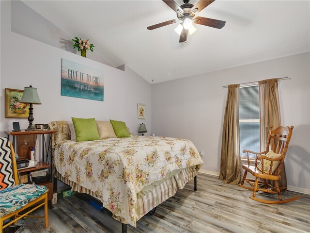 2540 12th Sq SW, Vero Beach, FL 32968 - bedroom featuring vaulted ceiling, wood finished floors, and a ceiling fan