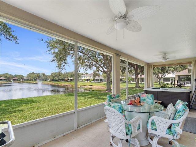 2540 12th Sq SW, Vero Beach, FL 32968 - sunroom / solarium with a jacuzzi, a water view, and a ceiling fan