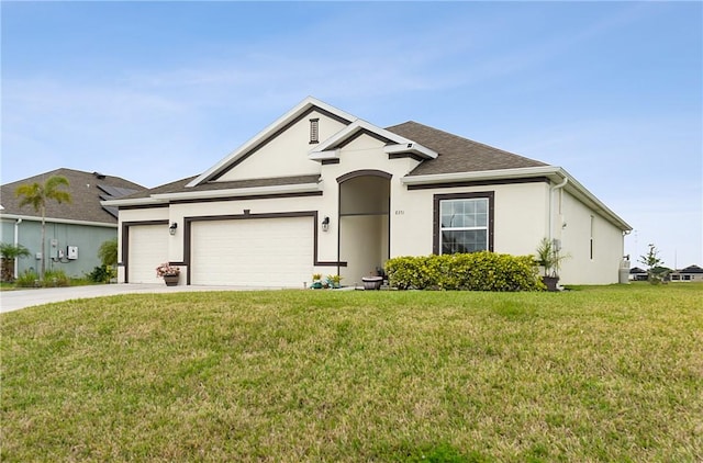 ranch-style home with a garage and a front lawn