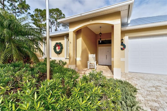 property entrance featuring a garage