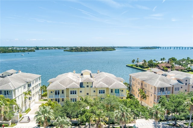 birds eye view of property featuring a water view