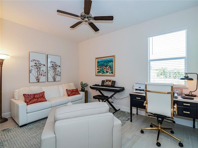 office space featuring ceiling fan and plenty of natural light