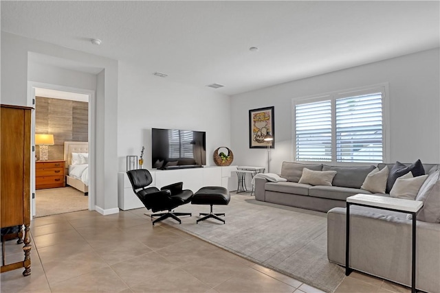 living room featuring light tile patterned floors