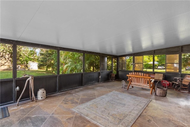 sunroom / solarium with lofted ceiling