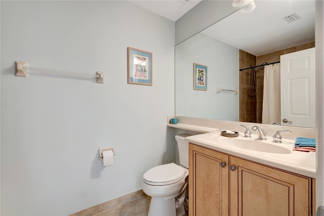 bathroom with toilet, vanity, tile patterned floors, and curtained shower