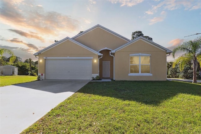 ranch-style home featuring a yard