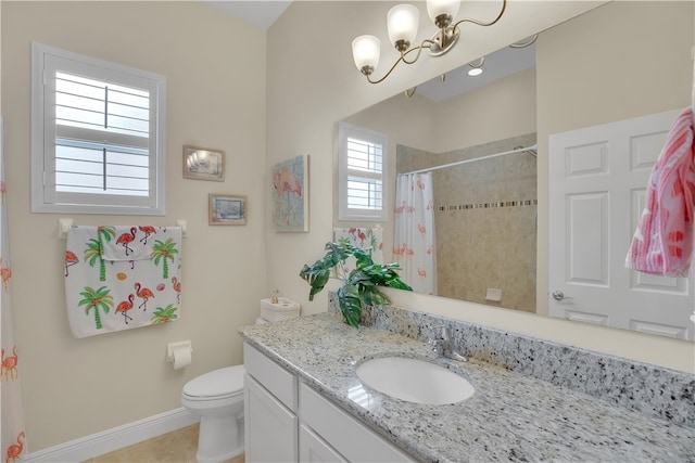 bathroom with walk in shower, tile patterned flooring, vanity, and toilet