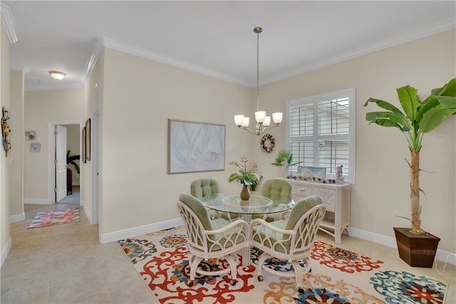 dining room featuring ornamental molding and a chandelier