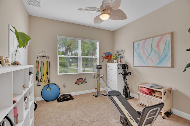 exercise area with carpet and ceiling fan