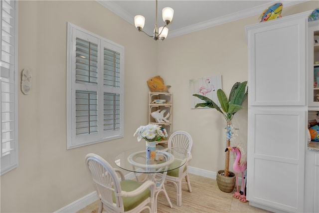 dining area with an inviting chandelier and ornamental molding