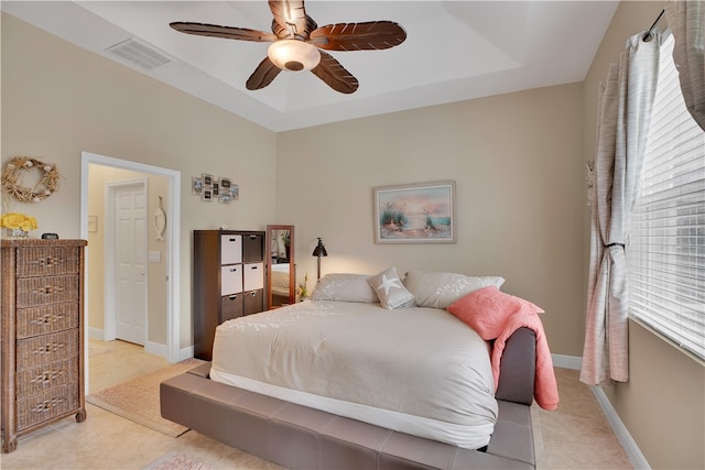 bedroom featuring ceiling fan and light tile patterned floors