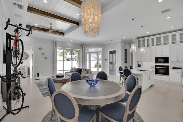 dining room with sink, ceiling fan, beam ceiling, wood ceiling, and crown molding