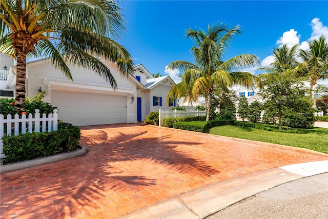 view of front of property featuring a garage