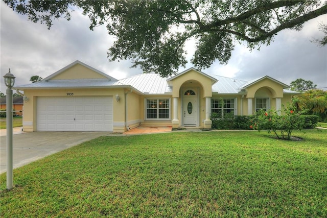 ranch-style house with a front yard and a garage