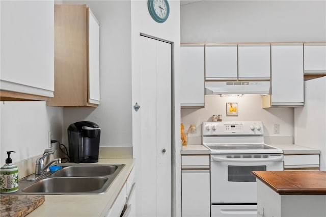 kitchen with white cabinets, white appliances, and sink