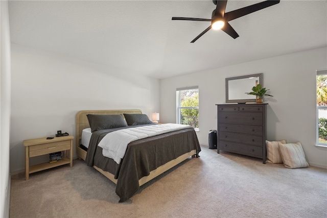 bedroom featuring ceiling fan and carpet floors