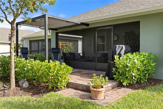 property entrance with a patio