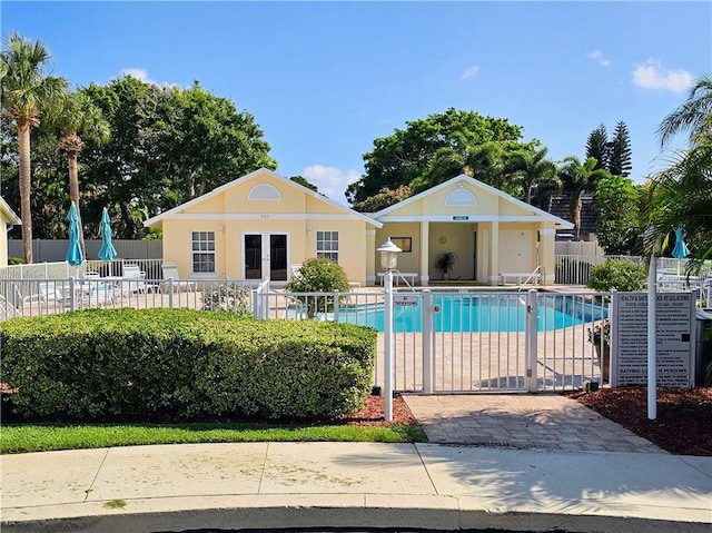 495 9th Pl, Vero Beach, FL 32960 - community pool featuring a patio and french doors