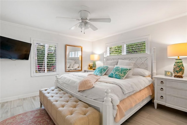 bedroom with ceiling fan, ornamental molding, and light hardwood / wood-style floors