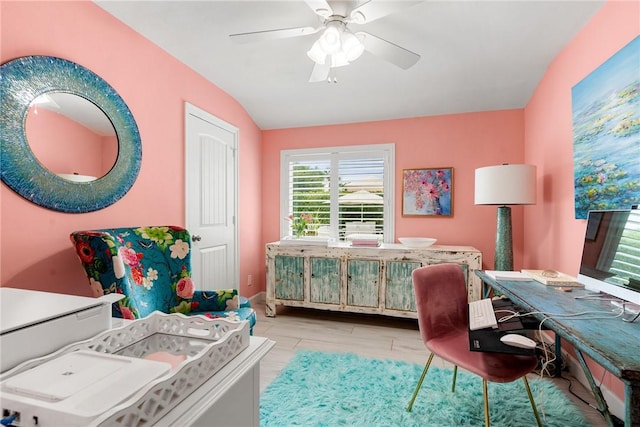 bedroom with ceiling fan and lofted ceiling