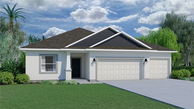 view of front facade with a garage and a front lawn