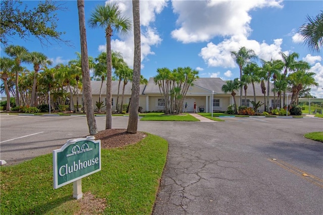 720 Lake Orchid Cir Unit 108, Vero Beach, FL 32962 - view of front of house featuring uncovered parking and stucco siding