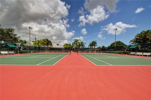 720 Lake Orchid Cir Unit 108, Vero Beach, FL 32962 - view of tennis court featuring community basketball court