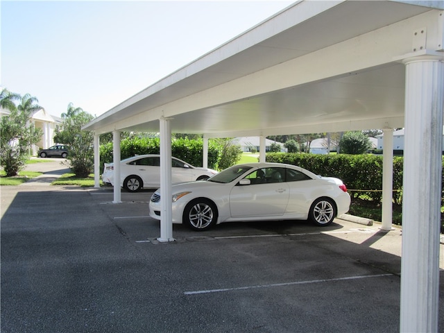 view of car parking featuring a carport