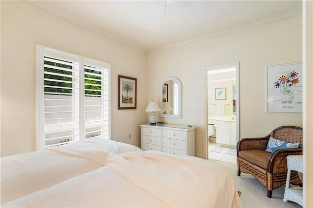 8409 Red Bay Ct Unit 8409, Vero Beach, FL 32963 - carpeted bedroom with ensuite bathroom and crown molding