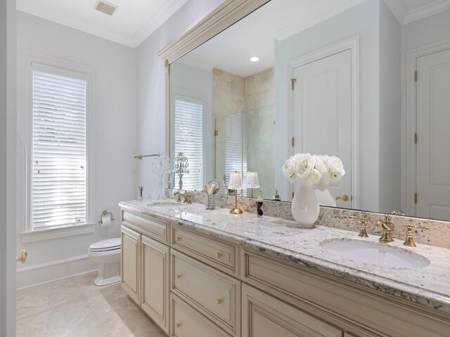 7 Beachside Dr, Vero Beach, FL 32963 - full bathroom featuring a sink, visible vents, toilet, and an enclosed shower