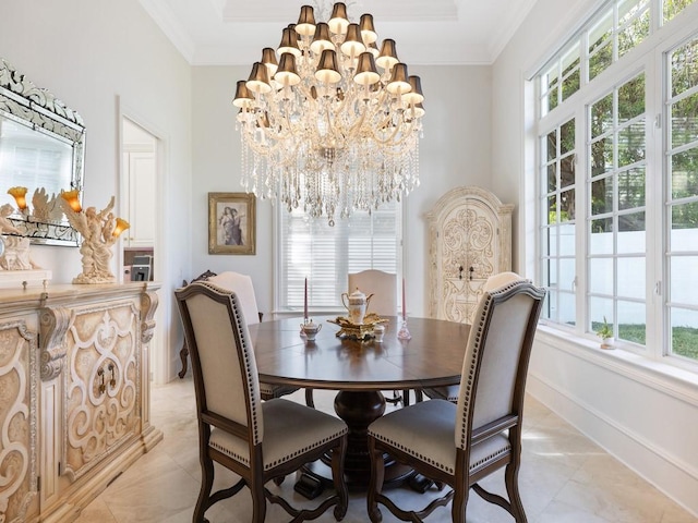 7 Beachside Dr, Vero Beach, FL 32963 - dining room featuring crown molding, baseboards, plenty of natural light, and a chandelier