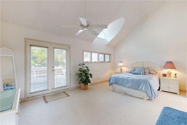 bedroom featuring baseboards, lofted ceiling, access to exterior, french doors, and carpet floors