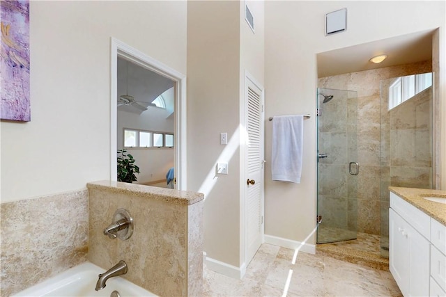 bathroom with a shower stall, visible vents, ceiling fan, and vanity