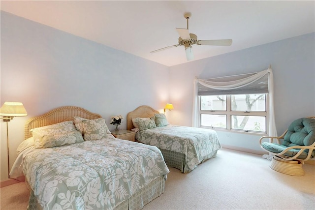 carpeted bedroom featuring a ceiling fan