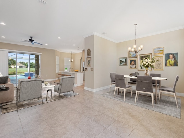 tiled dining room with ceiling fan with notable chandelier and crown molding