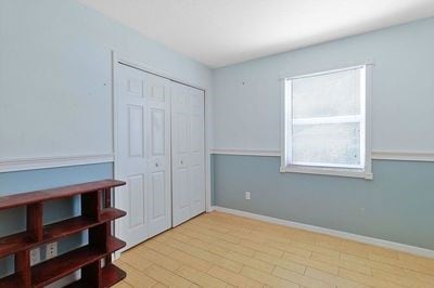 unfurnished room with light hardwood / wood-style flooring