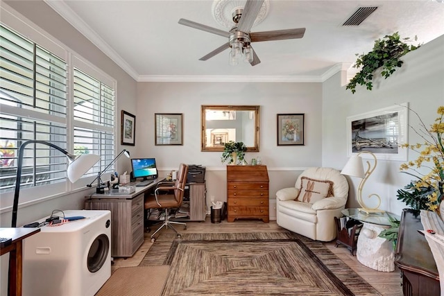 home office with ceiling fan and ornamental molding