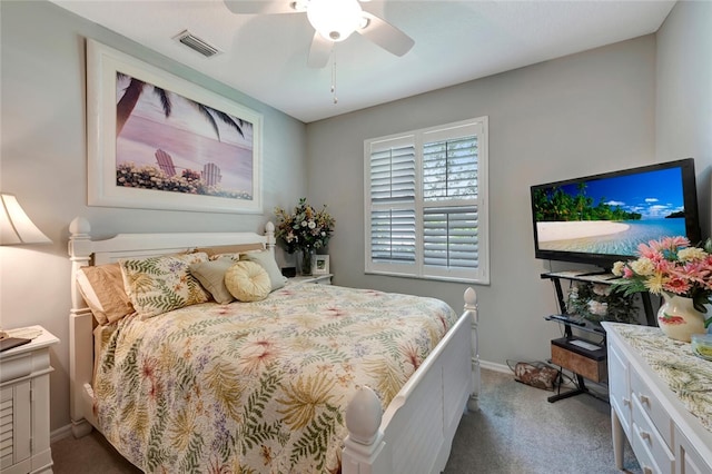 bedroom with dark carpet and ceiling fan