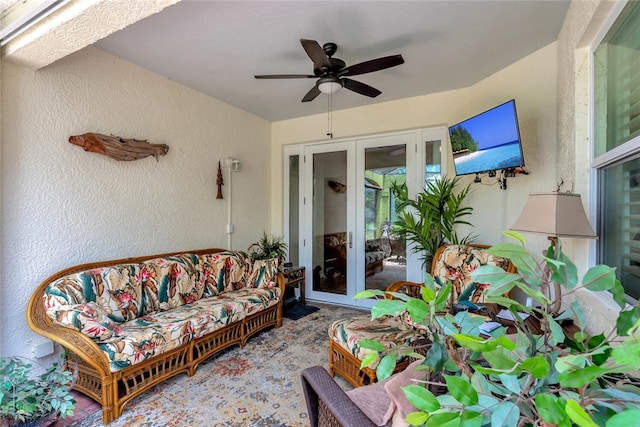 exterior space featuring french doors and ceiling fan