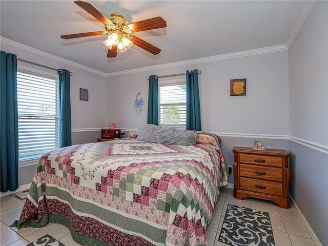 bedroom with ceiling fan, light tile patterned floors, and ornamental molding