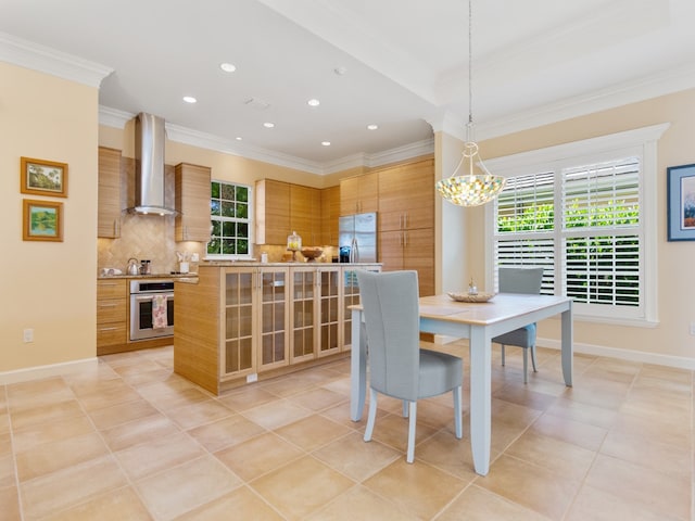 dining space with light tile patterned floors, an inviting chandelier, and crown molding