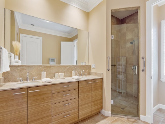 9082 Castle Harbour Cir, Vero Beach, FL 32963 - bathroom with a shower stall, crown molding, double vanity, decorative backsplash, and baseboards