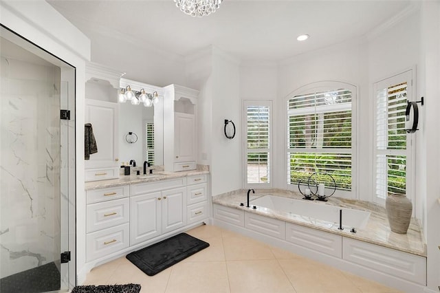 bathroom featuring tile patterned flooring, shower with separate bathtub, vanity, and crown molding