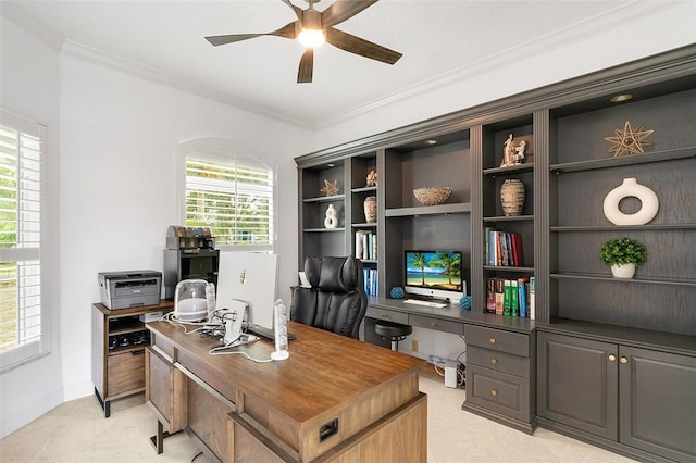 home office featuring crown molding and ceiling fan