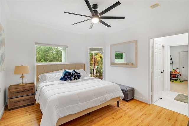 bedroom featuring hardwood / wood-style floors and ceiling fan