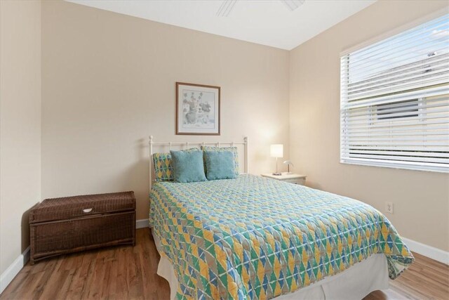 bedroom featuring wood-type flooring