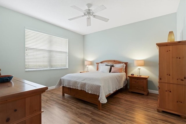 bedroom featuring wood-type flooring and ceiling fan