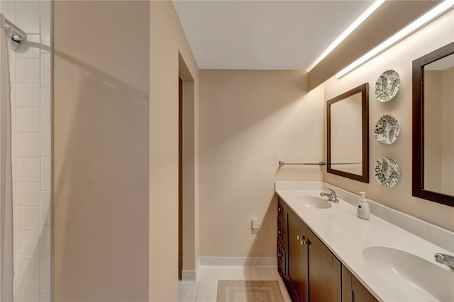 bathroom with vanity and tile patterned floors